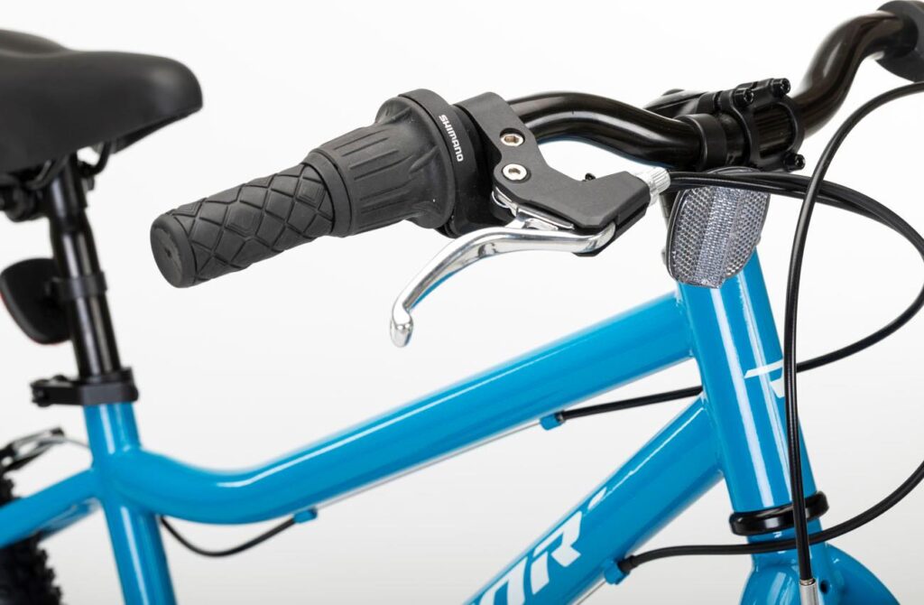Mando de cambio Shimano Revoshift en el puño y maneta de freno infantil de la Conor KID 20 pulgadas azul